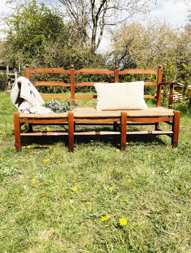 19th century French ladder back bench with rush seat